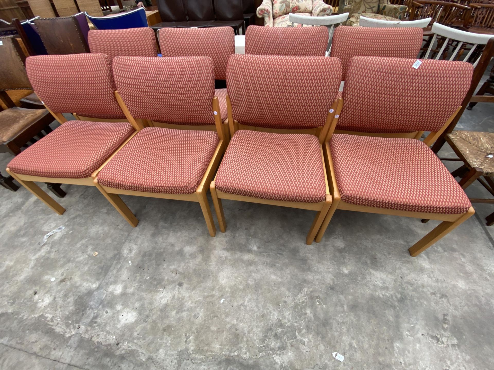 A SET OF EIGHT MODERN WOODEN FRAMED AND UPHOLSTERED FUNCTION CHAIRS