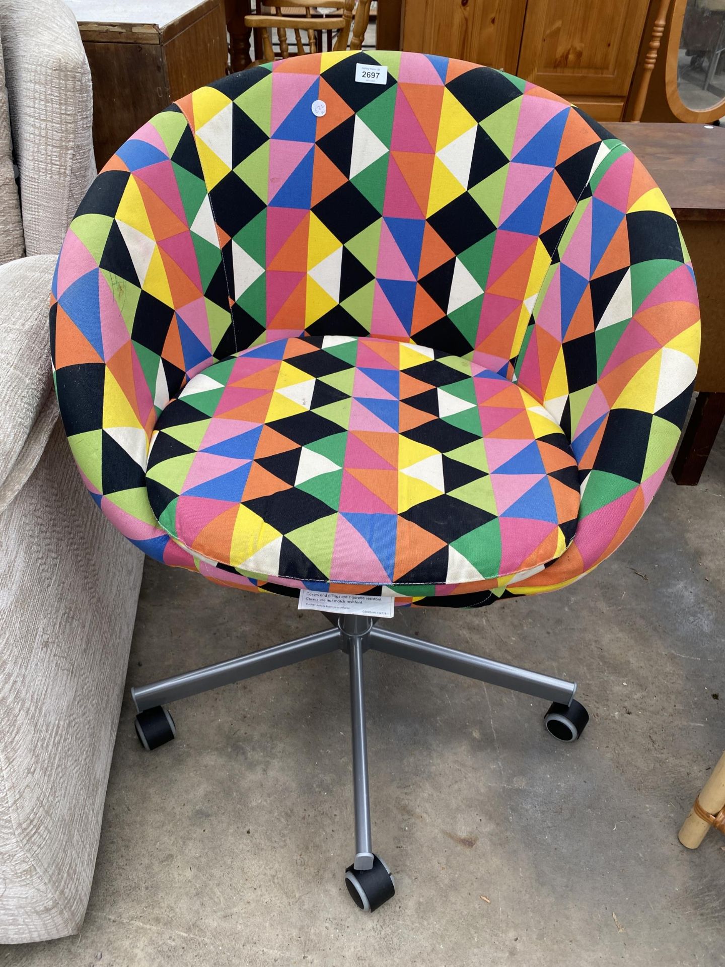 AN IKEA CARB P.2 MULTICOLOURED SWIVEL CHAIR