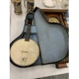 A BRITISH MADE VINTAGE CASED BANJO