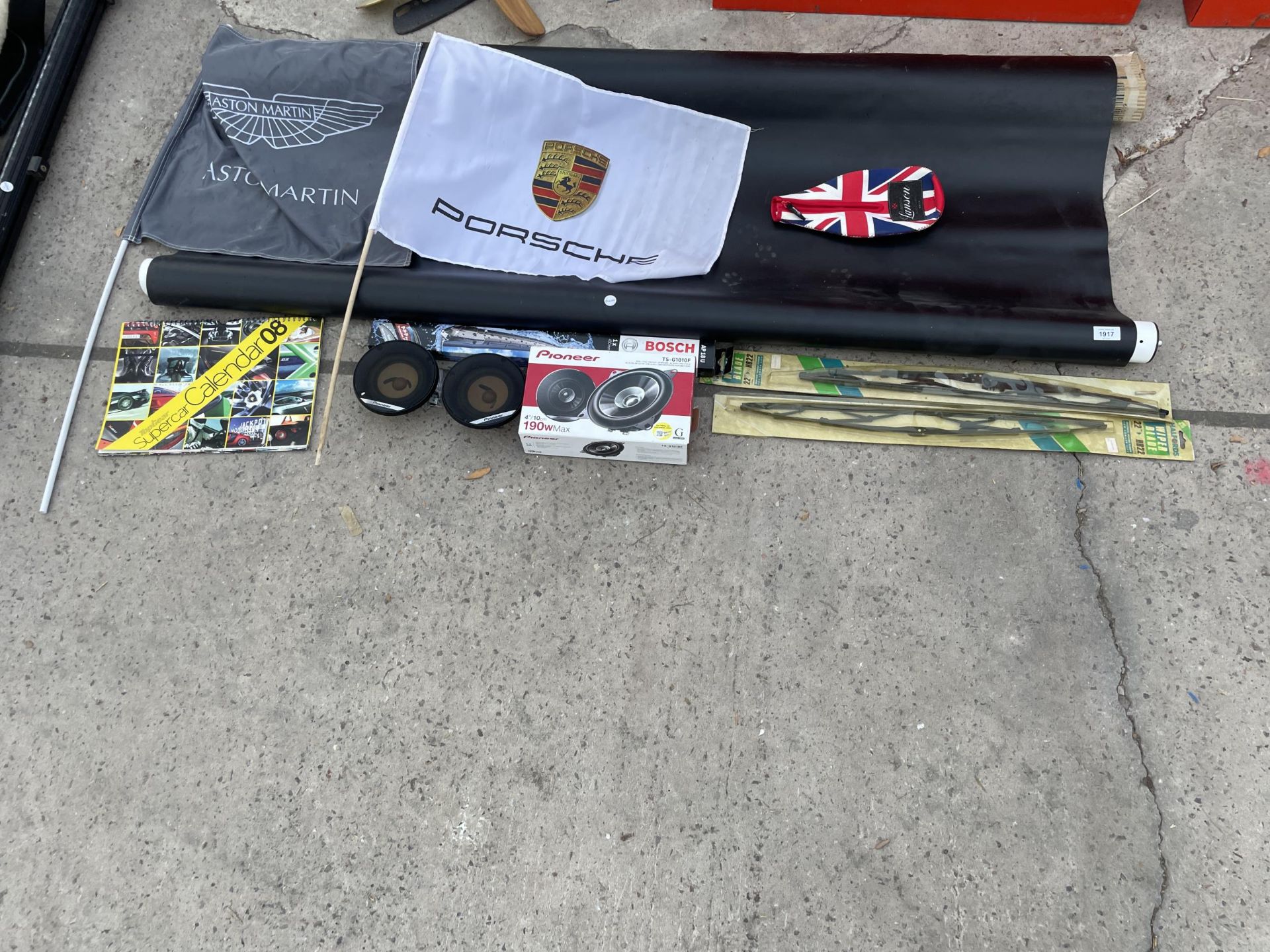 AN ASSORTMENT OF CAR ITEMS TO INCLUDE FLAGS, SPEAKERS AND WINDOW WIPERS ETC