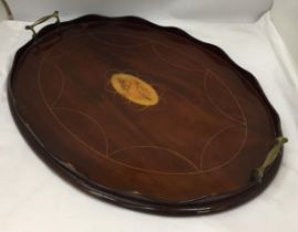 AN EDWARDIAN MAHOGANY BUTLERS DRINKS TRAY WITH INLAID CONCH SHELL DESIGN