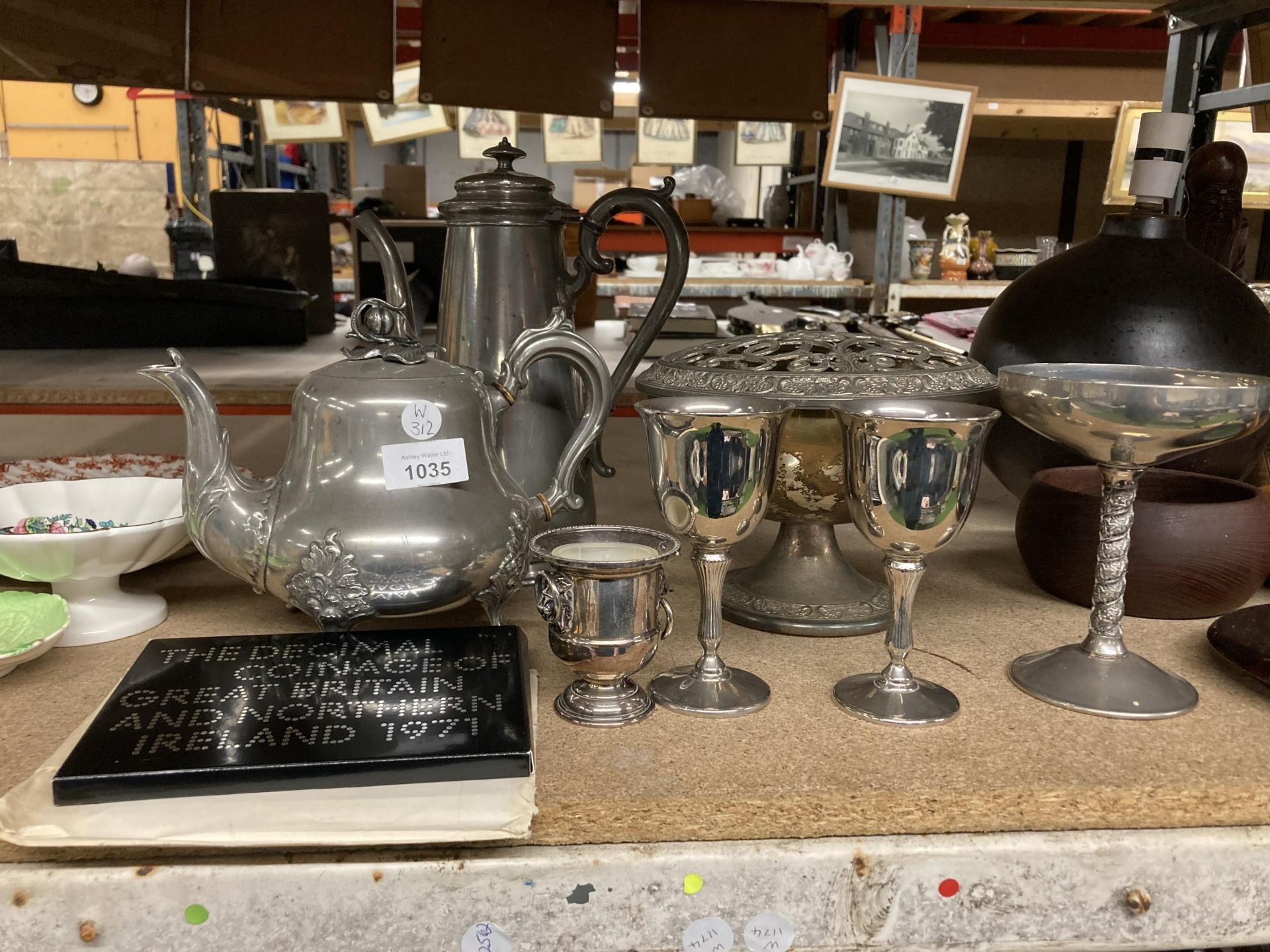 A MIXED LOT OF SILVER PLATED WARES TO INCLUDE GOBLETS, CHALICE, PEWTER ORNATE TEA AND COFFEE POTS,
