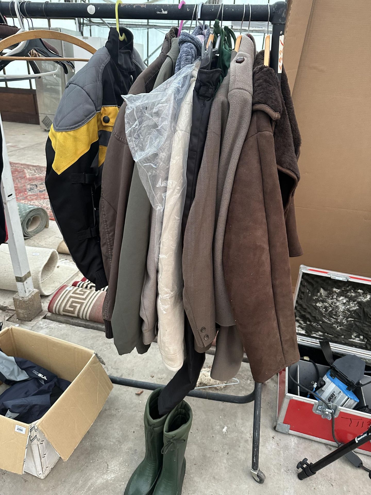 AN ASSORTMENT OF MENS AND WOMENS JACKETS AND A PAIR OF WELLIES