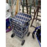 A FOUR WHEELED SHOPPING BAG TROLLEY