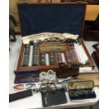 A RAYNER OPTICAL TESTING SET COMPLETE WITH LENS', TESTING GLASSES, CASED SPECTACLES ETC