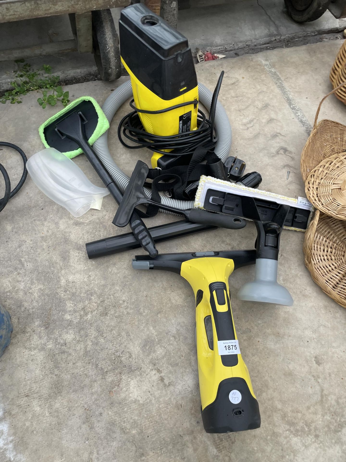A KARCHER STEAM CLEANER AND A KARCHER WINDOW CLEANER