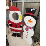 A HAND PAINT SNOWMAN AND SANTA FIGURES WITH CUT OUT HOLE ON THE SANTA (H:93CM)
