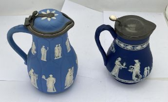 TWO JASPERWARE CLASSICAL JUGS TO INCLUDE A WEDGWOOD BLUE JASPER DIP JUG WITH PEWTER LID