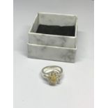 A BOXED SILVER AND OPAL RING