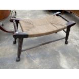 A GEORGE III STYLE SADDLE STOOL WITH RUSH SEAT