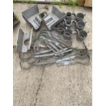 AN ASSORTMENT OF ALUMINIUM GUTTER AND DOWNSPOUT BRACKETS ETC