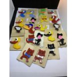 A BAG OF 1950'S PLASTIC BROOCHES