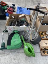 AN ASSORTMENT OF ITEMS TO INCLUDE A GOLF TROLLEY AND A SPRINKLER ETC