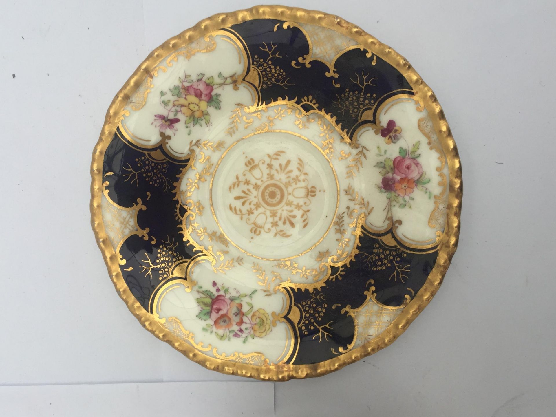 AN ANTIQUE COALPORT BLUE AND GILT Y3517 CUP AND SAUCER - Image 3 of 4