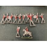 A VINTAGE 12 PIECE LEAD REDCOAT BRASS BAND