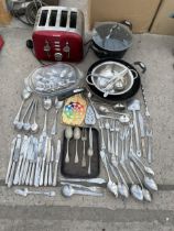 AN ASSORTMENT OF KITCHEN ITEMS TO INCLUDE FLATWARE AND A TOASTER ETC