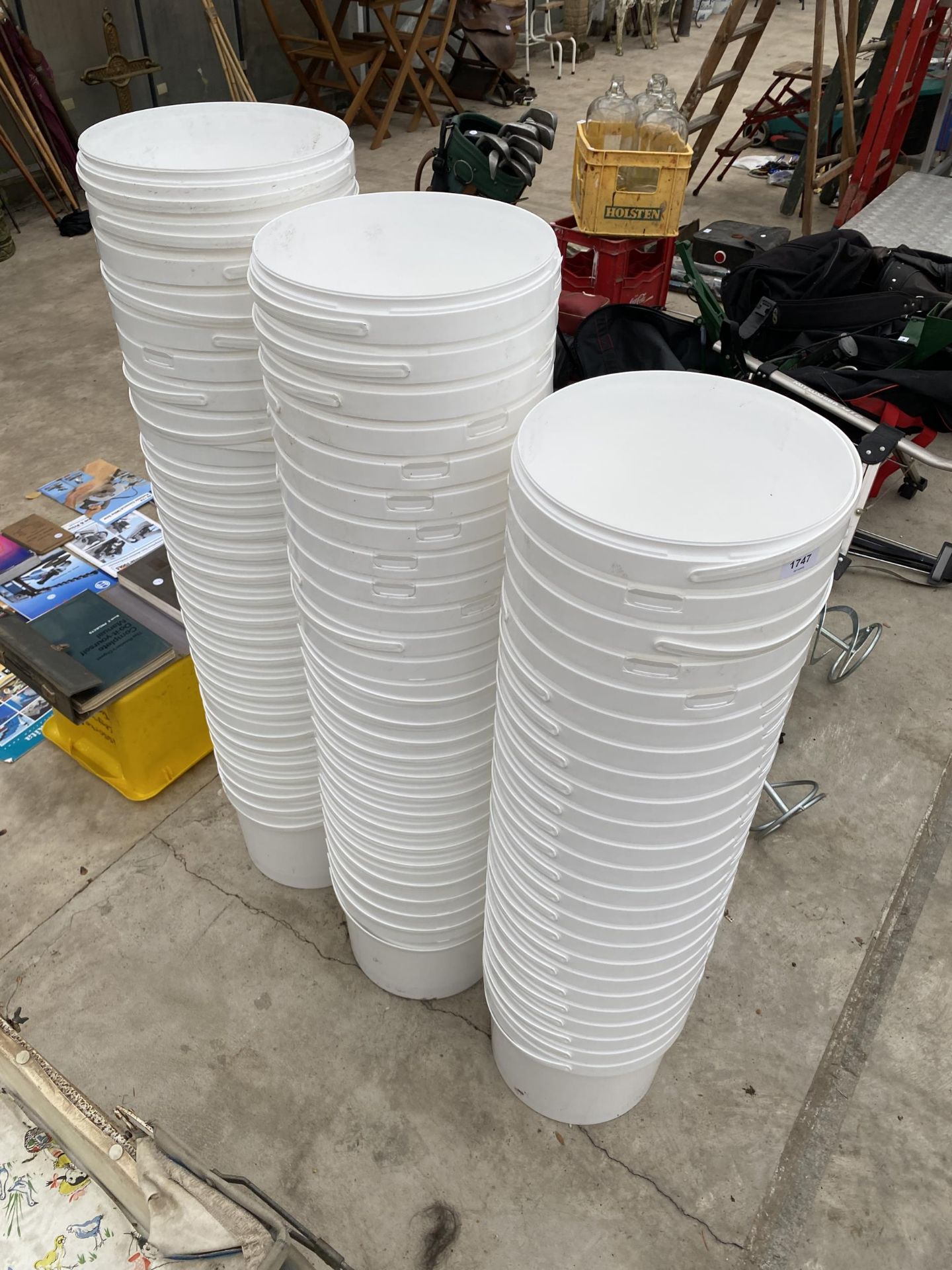 A LARGE QUANTITY OF WHITE BUCKETS
