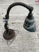 A VINTAGE ENGINEERED ADJUSTABLE LAMP