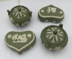 A GROUP OF FOUR WEDGWOOD GREEN JASPERWARE LIDDED ITEMS TO INCLUDE PAIR OF SUGAR BOWLS ETC