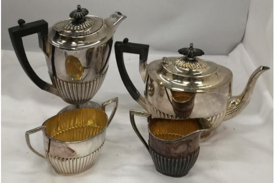 A WALKER AND HALL FOUR PIECE VINTAGE SILVER PLATED A1 EPNS TEA SET - Image 1 of 5