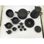 A COLLECTION OF BLACK BASALT CERAMIC TEA WARES, TEAPOT, COFFEE POT, MINIATURE TEAPOT ETC