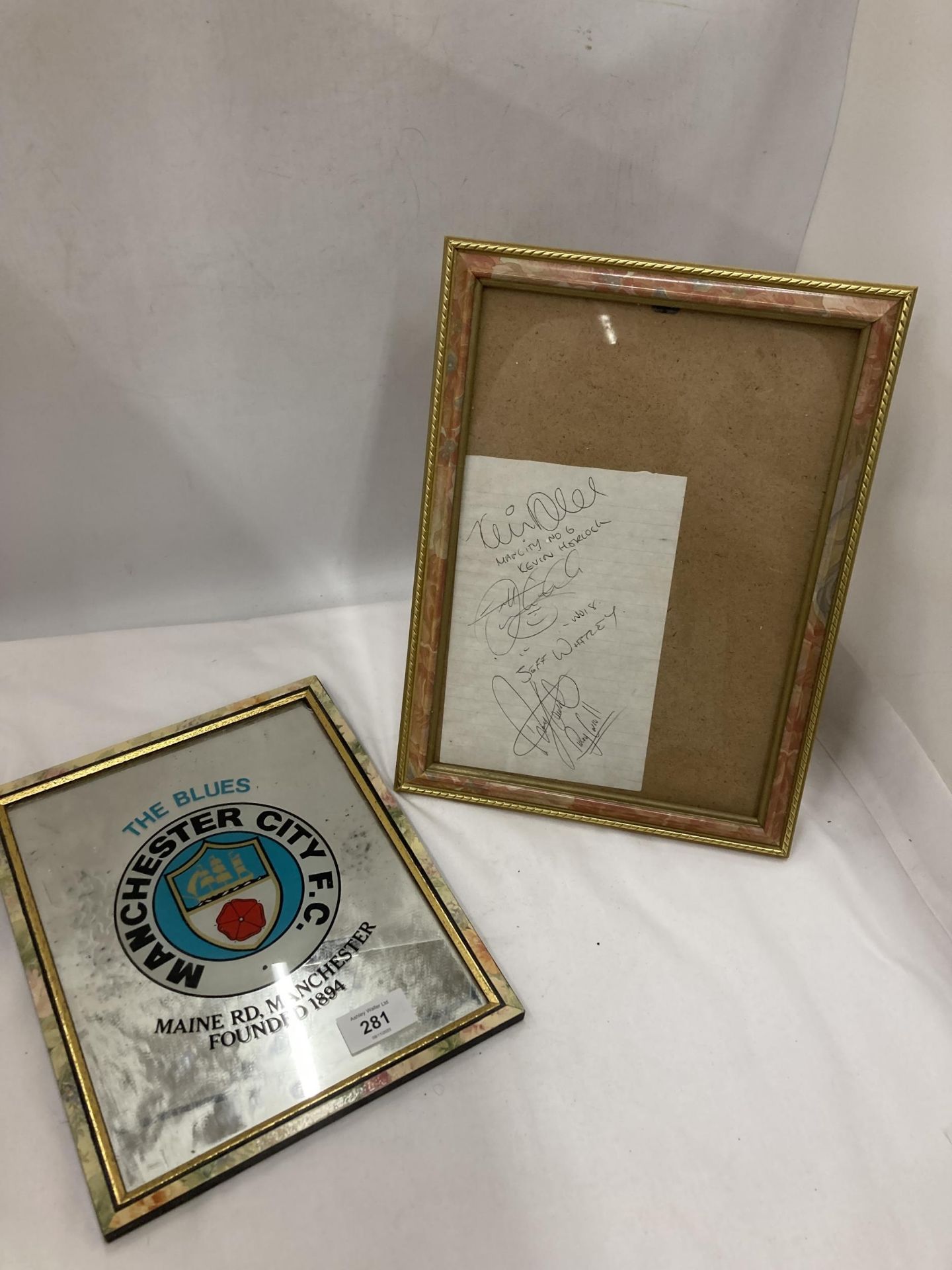 A FRAMED MANCHESTER CITY MIRROR AND SIGNED KEVIN HORLOCK PAPER