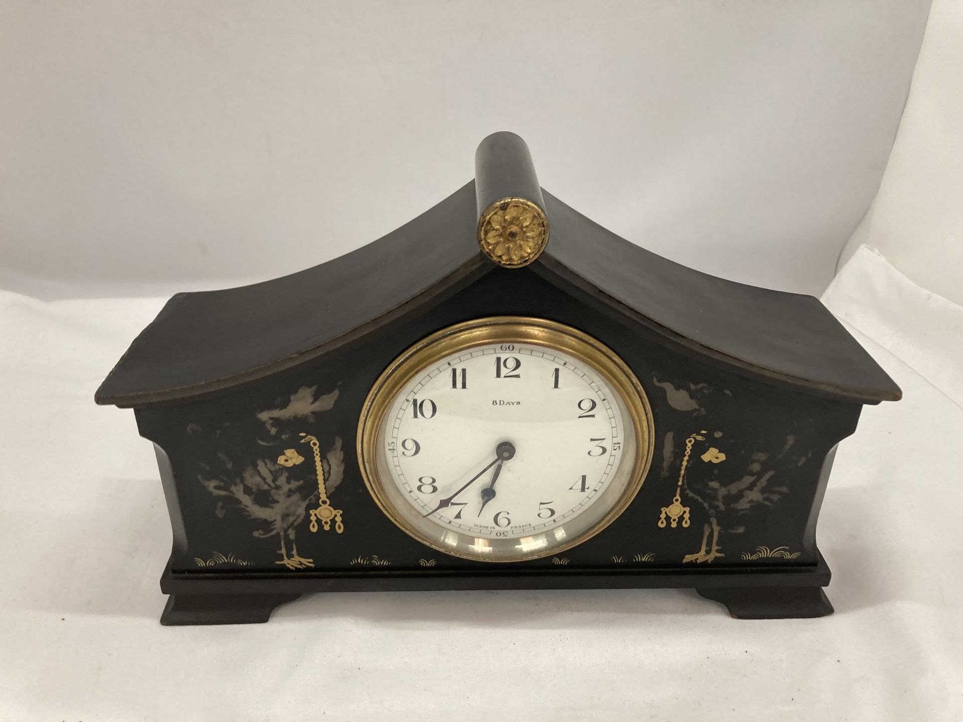 AN INLAID ORIENTAL STYLE MANTLE CLOCK