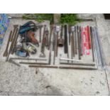 A LARGE ASSORTMENT OF TOOLS TO INCLUDE SDS CHISELS, DRILL BITS AND POWER TOOLS ETC