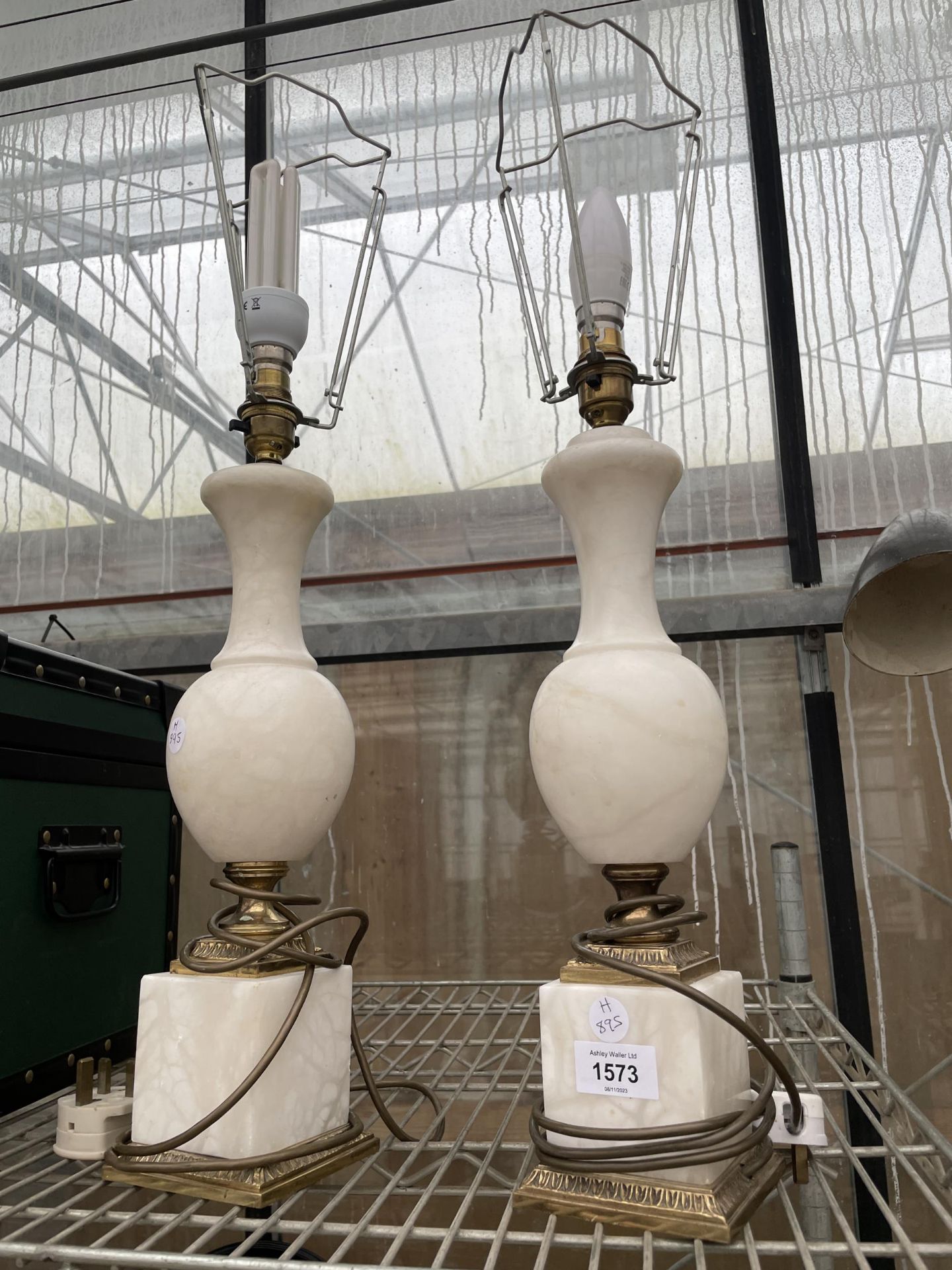A PAIR OF BRASS AND ONYX STYLE TABLE LAMPS
