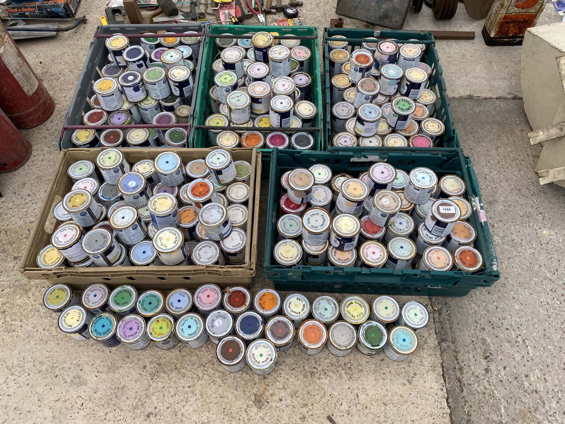 A LARGE QUANTITY OF SMALL TINS OF PAINT