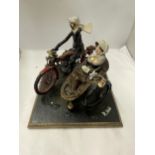 AN UNUSUAL SCULPTURE OF A MAN AND WOMAN ON A MOTORBIKE WITH SIDE CAR, INDISTINCTLY SIGNED,