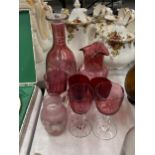 A COLLECTION OF CRANBERRY GLASS TO INCLUDE WINE GLASSES AND LARGE ETCHED DECANTER ETC