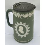 A WEDGWOOD SAGE GREEN JASPERWARE JUG WITH PEWTER JUG