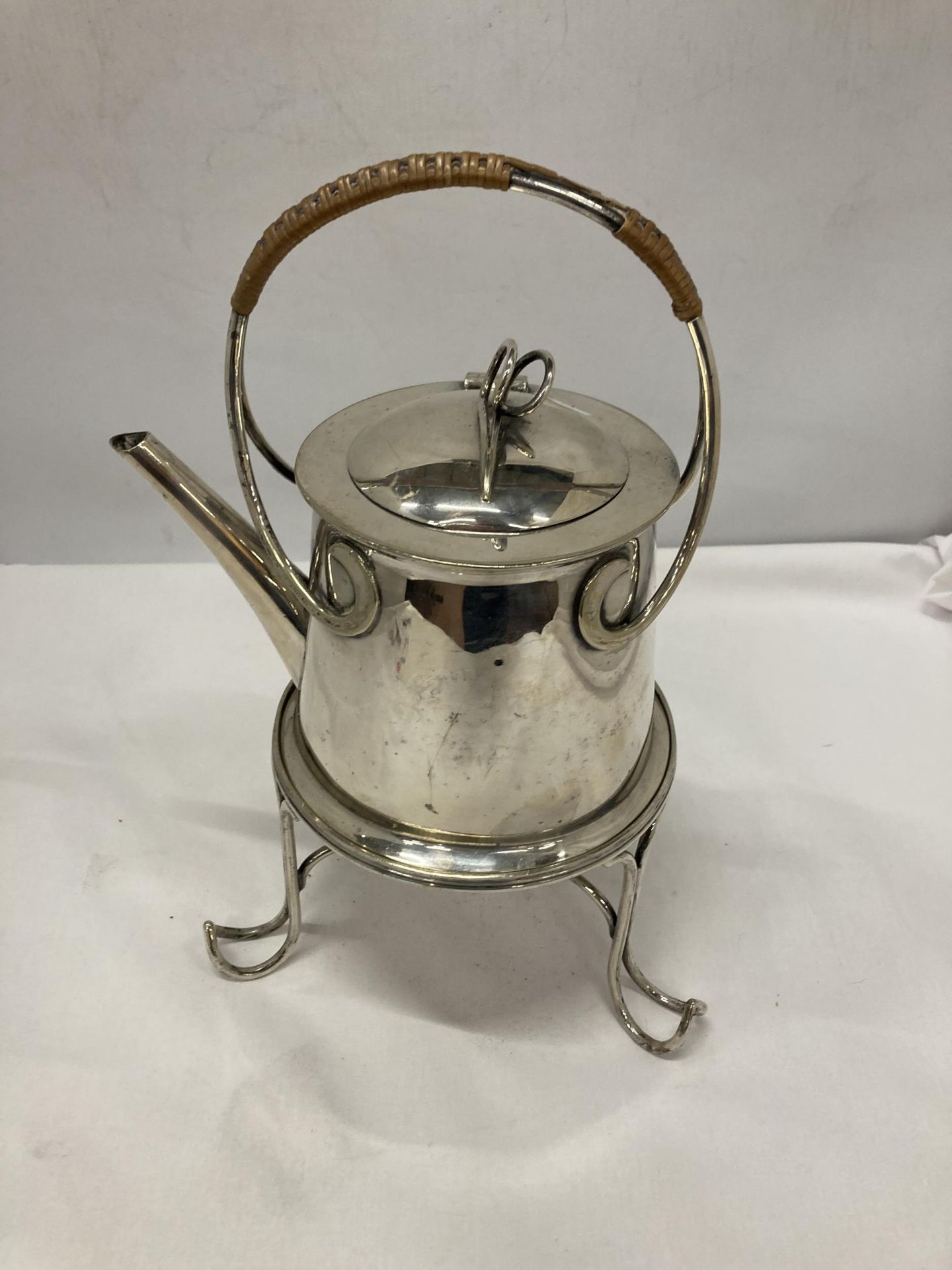 A VINTAGE SILVER PLATED SPIRIT KETTLE ON STAND - NO BURNER