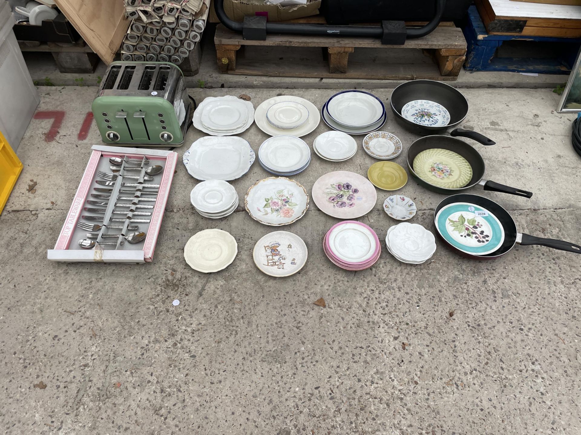 AN ASSORTMENT OF KITCHEN PANS AND CERMIC PLATES ETC