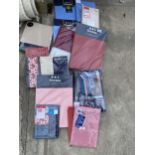 AN ASSORTMENT OF NEW AND PACKAGED BEDDING