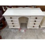 A PAINTED PINE KNEEHOLE DRESSING TABLE, 56" WIDE