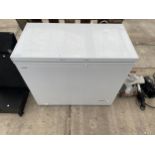 A WHITE LOGIK CHEST FREEZER BELIEVED IN WORKING ORDER BUT NO WARRANTY