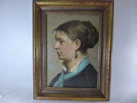 A LATE 19TH/EARLY 20TH CENTURY PORTRAIT OF A YOUNG LADY, OIL ON CANVAS, BEARS MONOGRAM H.M, 41 X
