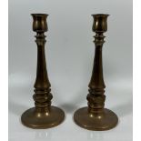 A VINTAGE PAIR OF CHURCH GOTHIC CANDLESTICKS WITH SCREW IN HOLE TO THE BASE POSSIBLY FOR AN ALTAR,