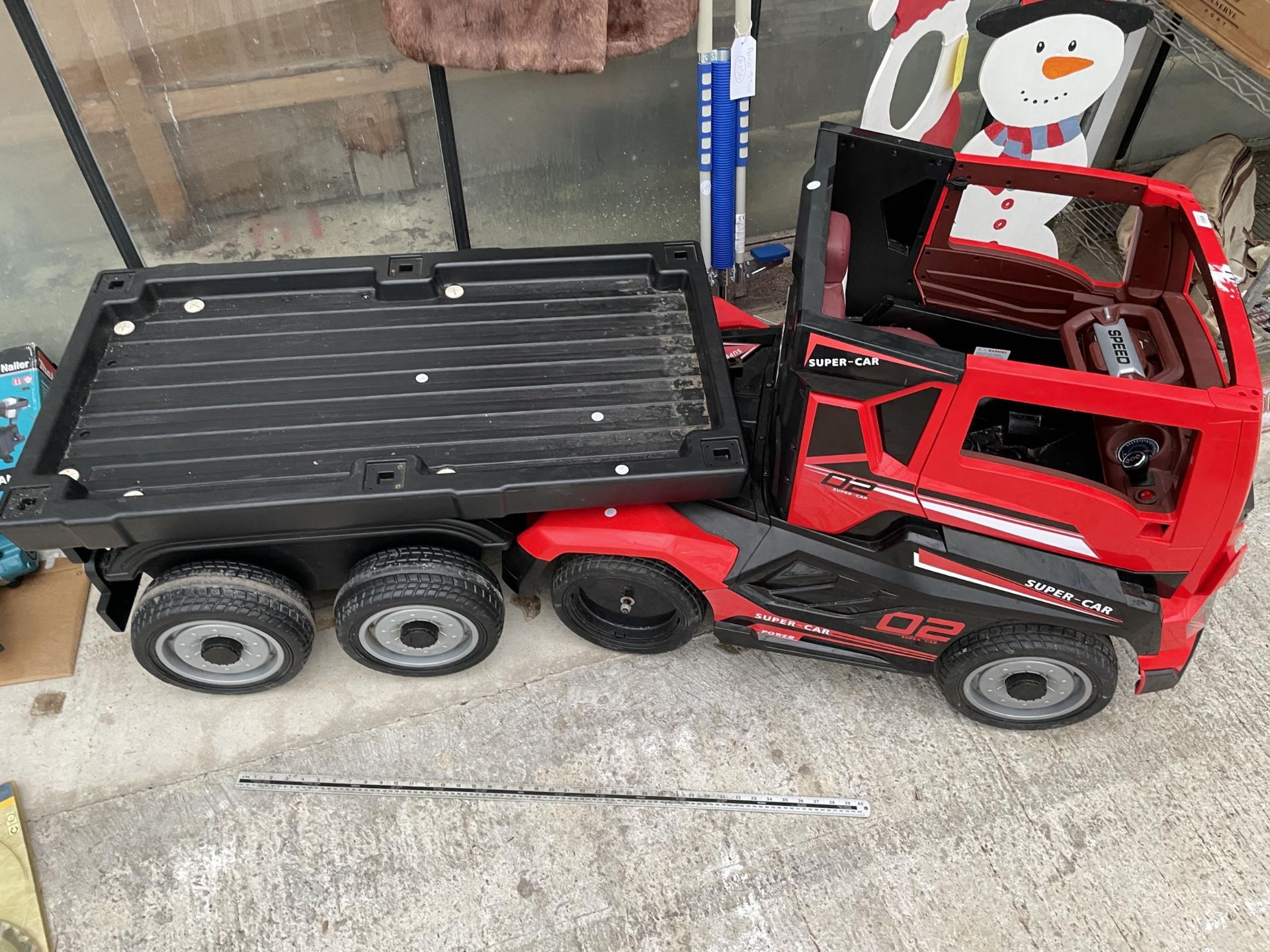 A 'SUPER CAR' BATTERY POWERED CHILDS RIDE ALONG BATTERY WAGON AND TRAILER COMPLETE WITH CHARGER, - Image 8 of 8