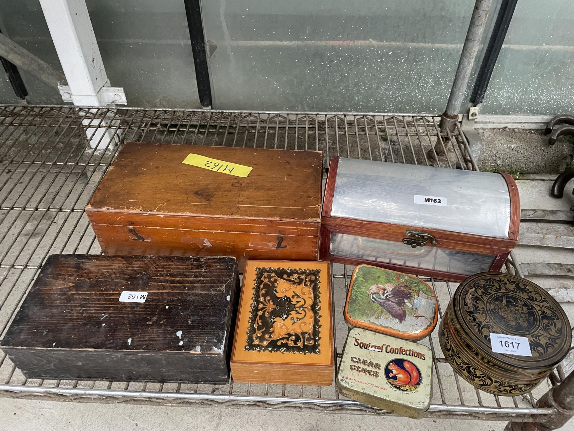 AN ASSORTMENT OF VINTAGE TINS AND WOODEN STORAGE BOXES