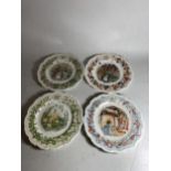 A SET OF FOUR ROYAL DOULTON BRAMBLEY HEDGE SEASONS PLATES