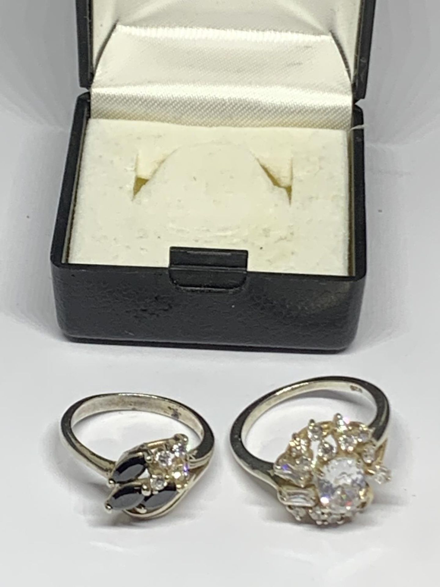 TWO BOXED SILVER RINGS