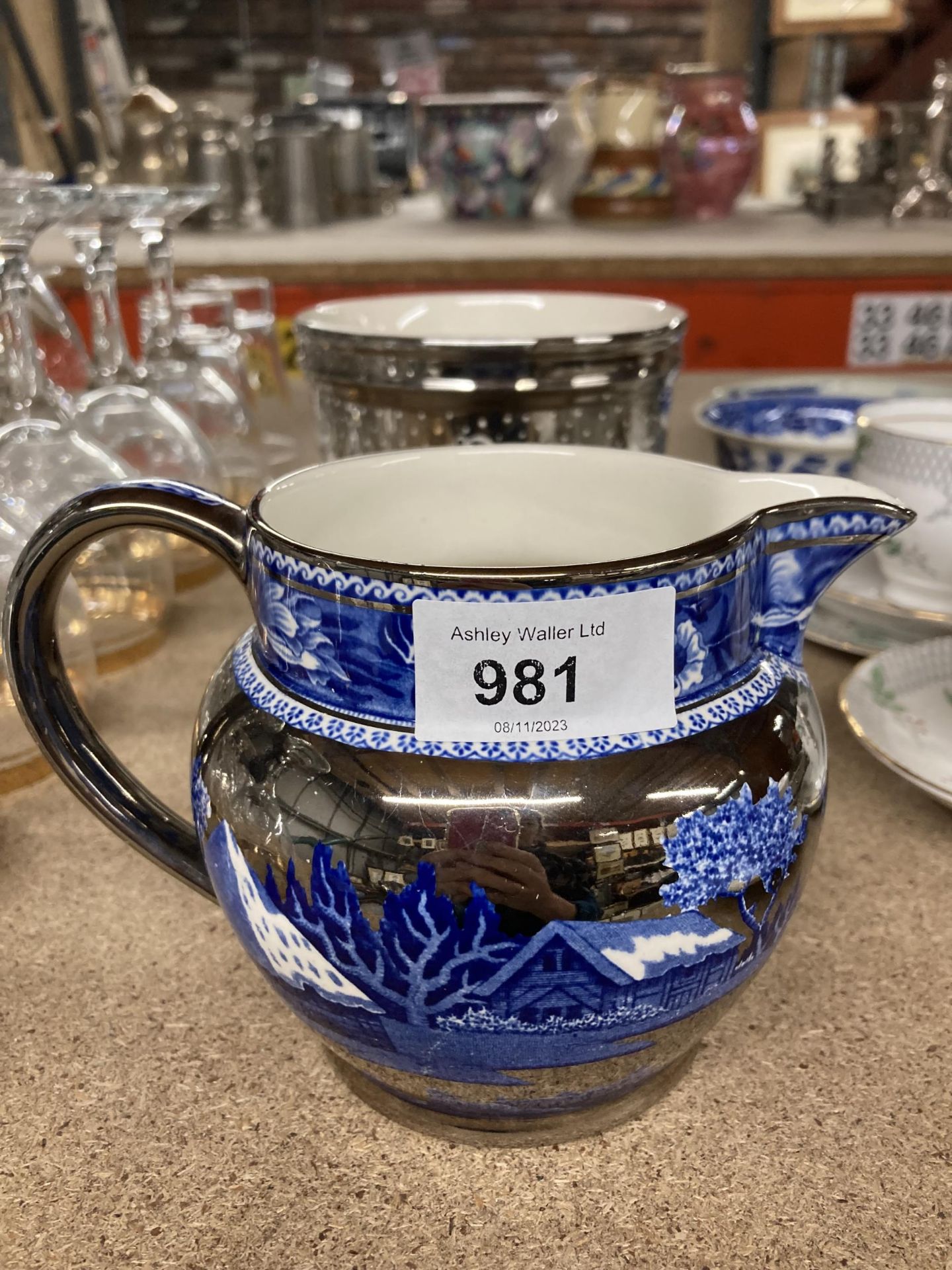 TWO PIECES OF WEDGWOOD OF ETRURIA TO INCLUDE A JUG 'FALLOW DEER' AND A SILVER COLOURED PLANTER