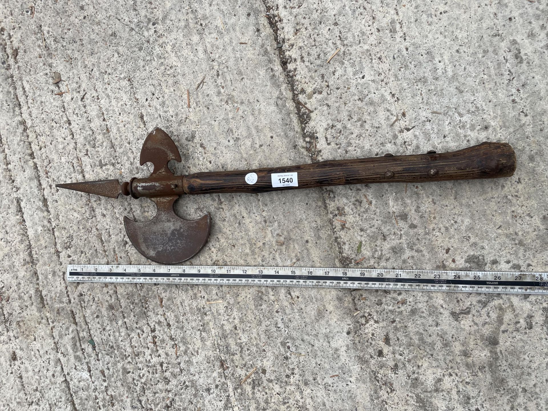 A VINTAGE WOODEN HANDLED AXE