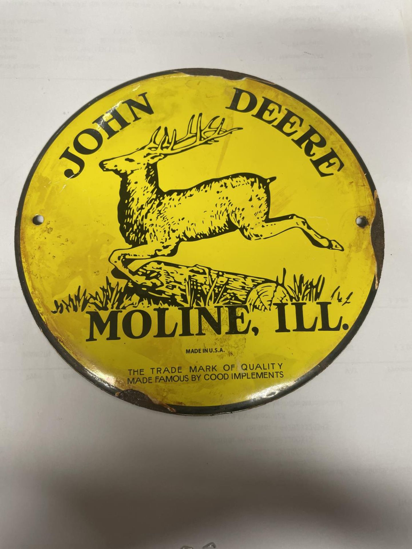 A SMALL JOHN DEERE ENAMEL SIGN, DIAMETER 15.5CM