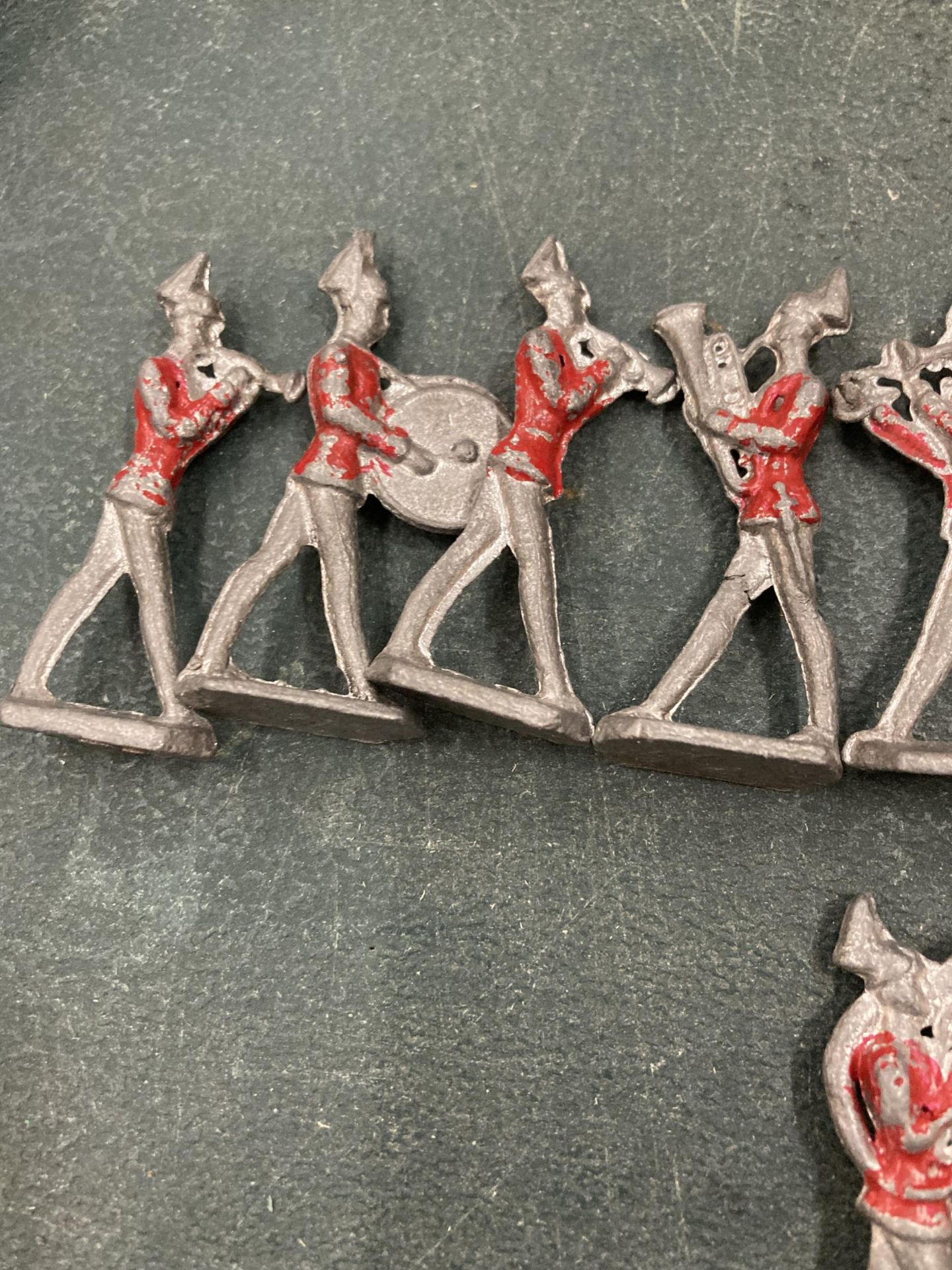 A VINTAGE 12 PIECE LEAD REDCOAT BRASS BAND - Image 2 of 5