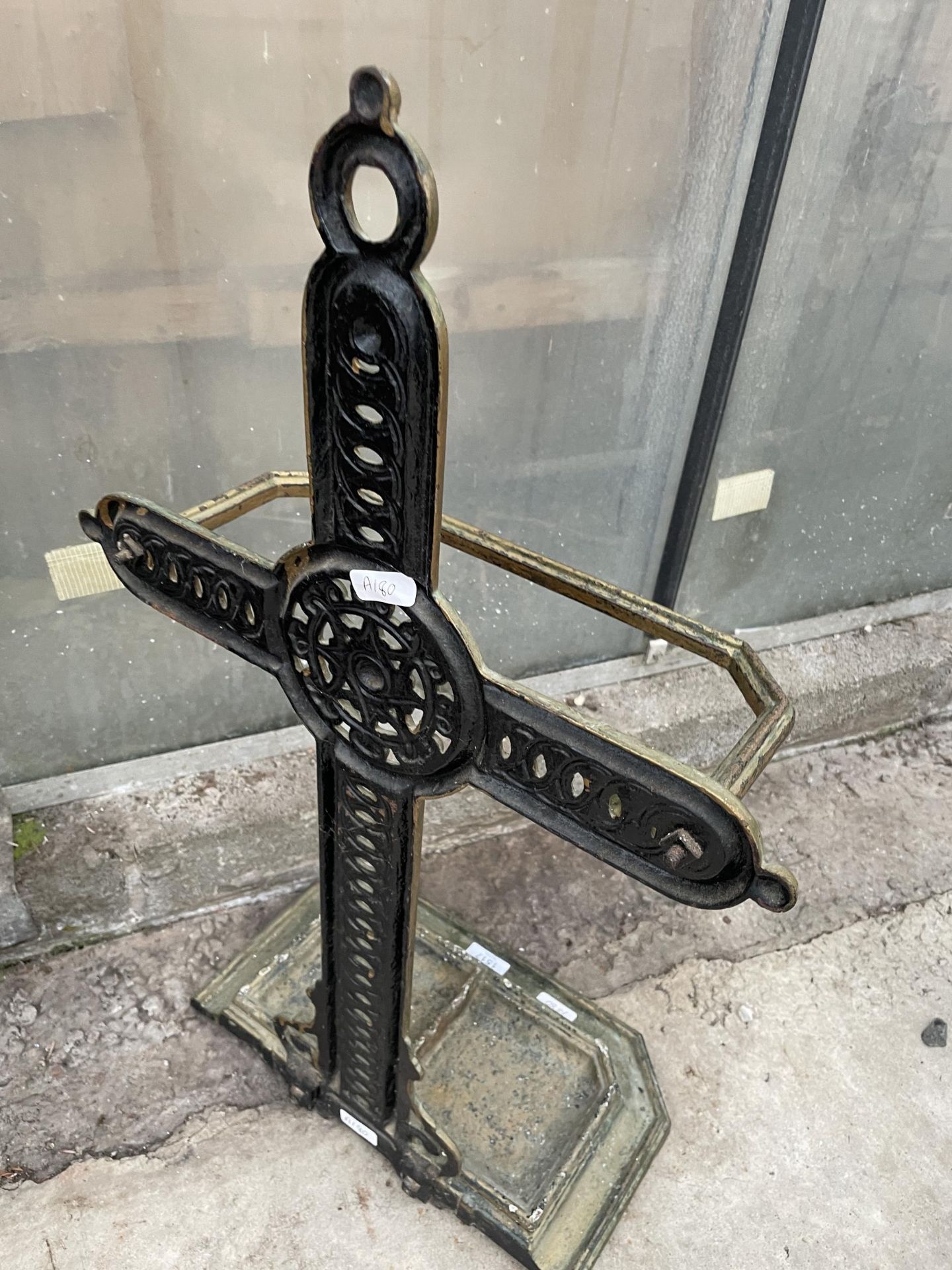 A VINTRAGE CAST IRON UMBRELLA STAND WITH DRIP TRAY - Image 3 of 3