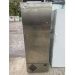 A LARGE STAINLESS STEEL INDUSTRIAL FRIDGE